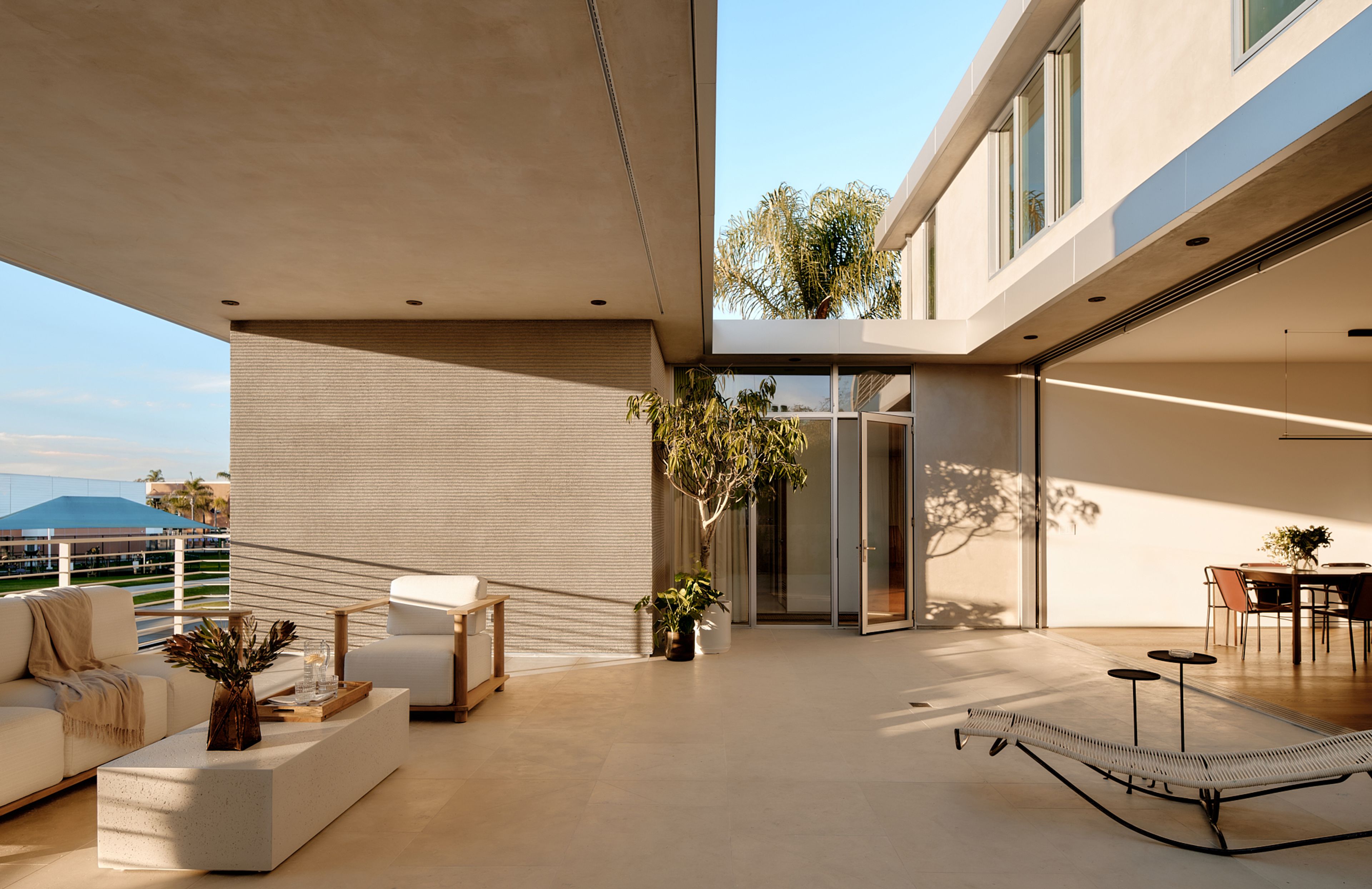The covered veranda expands the living space to the outdoors