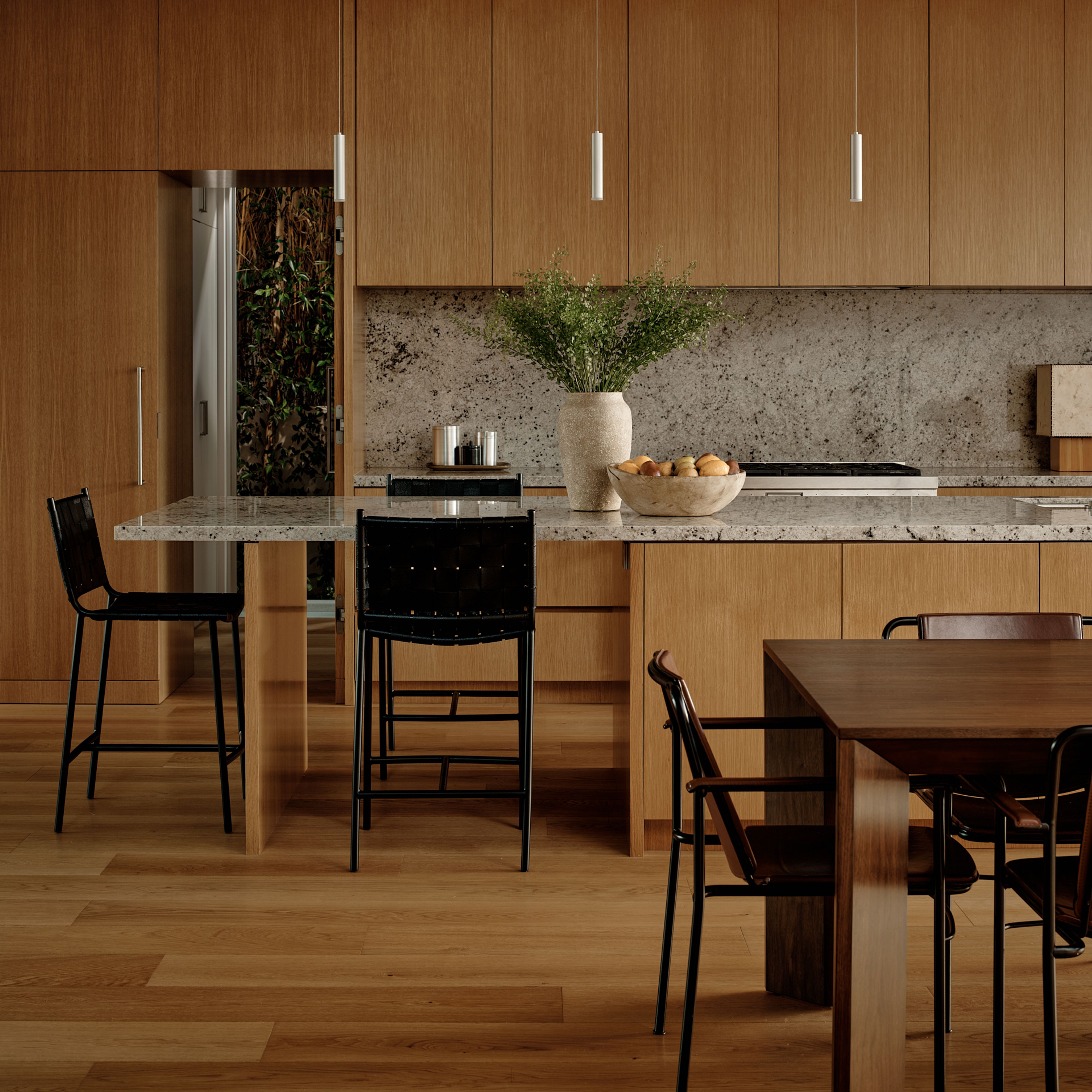 A separate butler's pantry is hidden behind a cabinet door