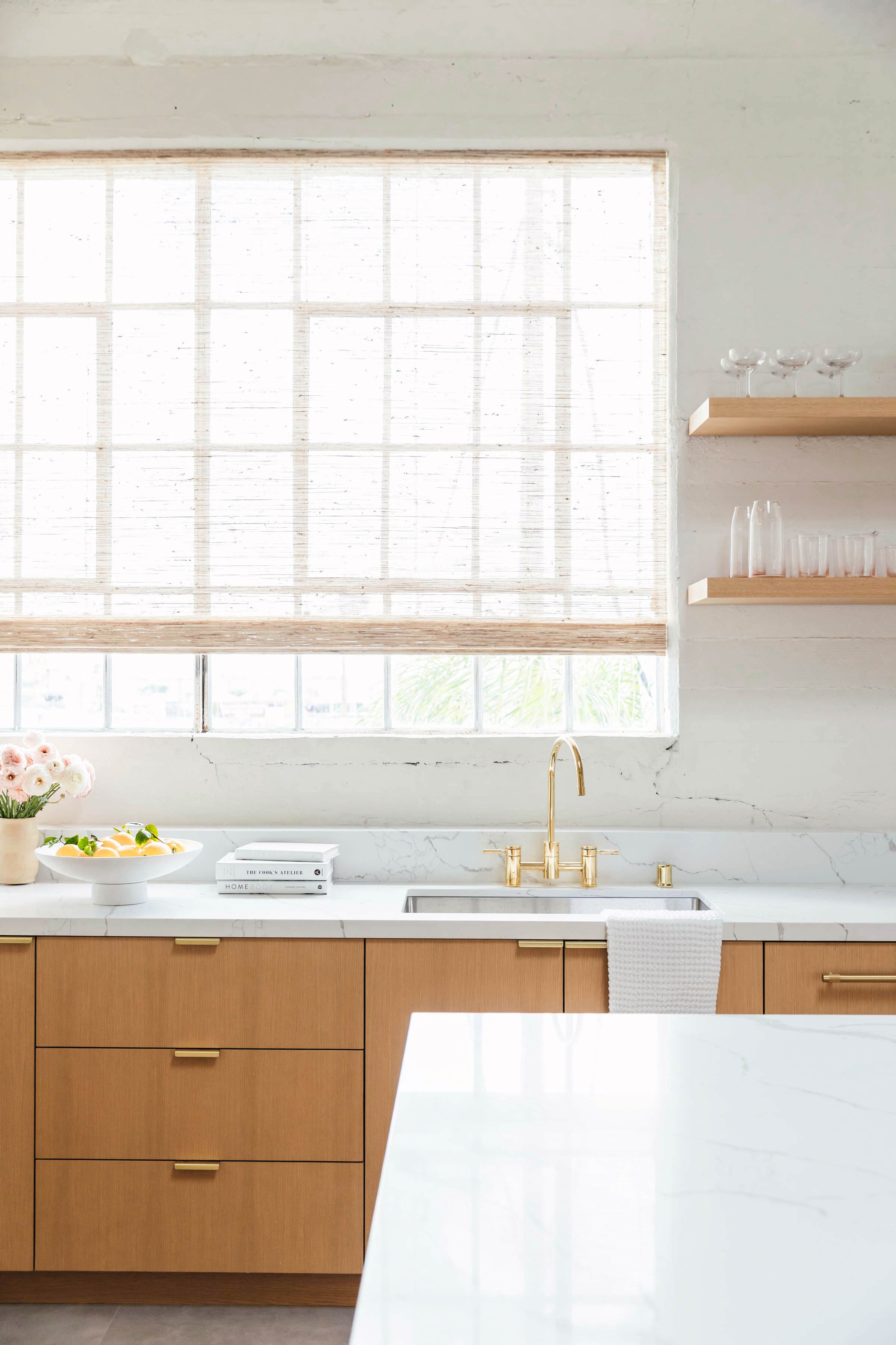 Brass accents paired with custom cabinets