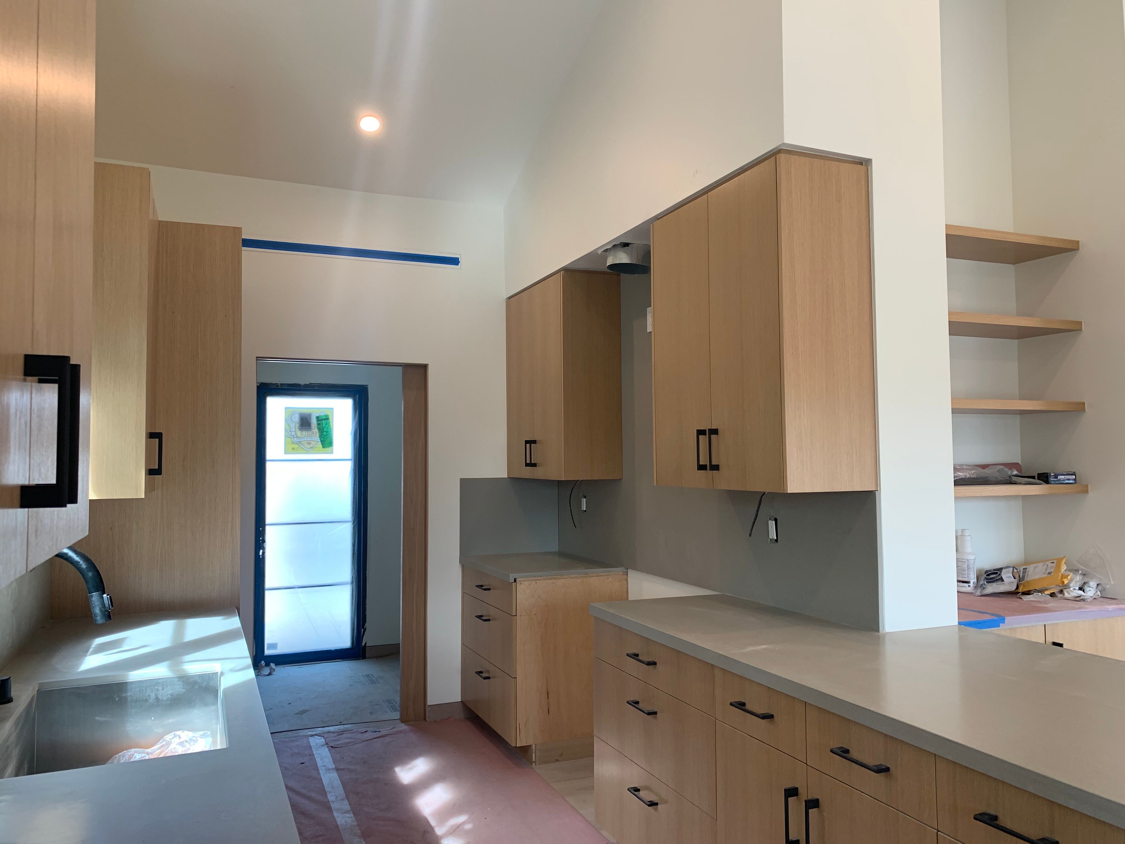 White oak kitchen cabinets and quartz counters