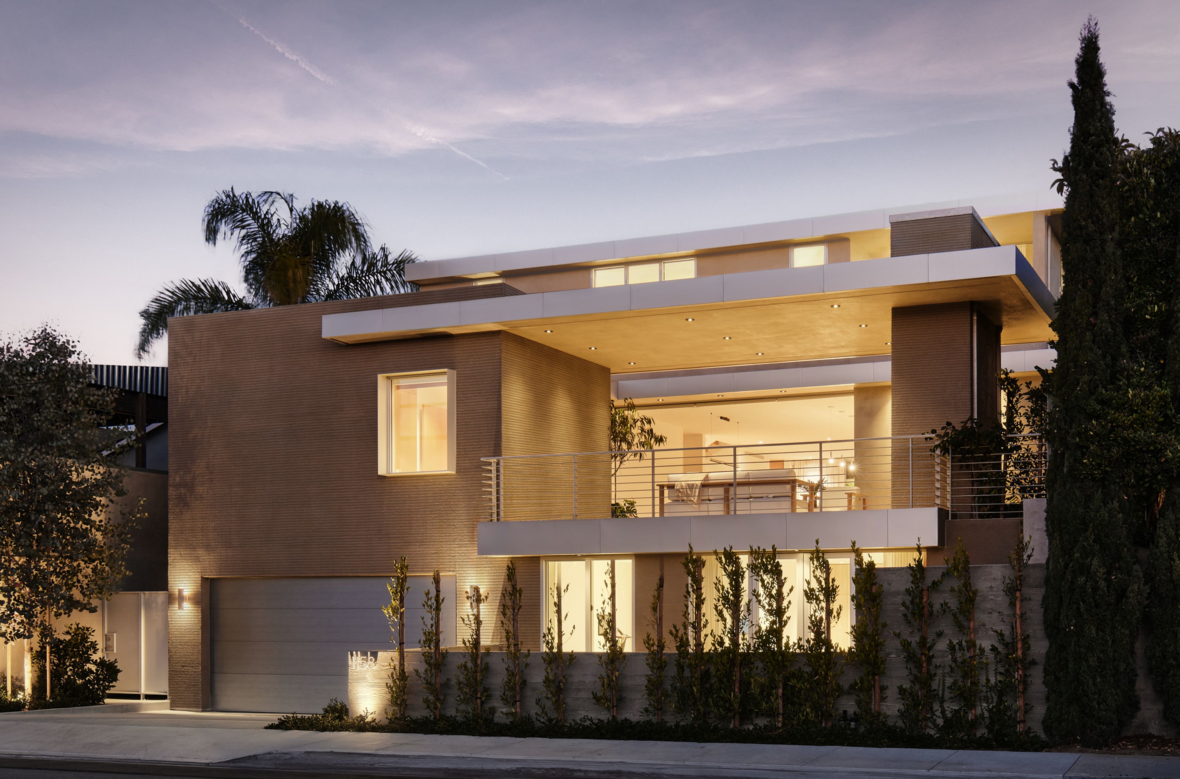 A view of the back of the house at dusk