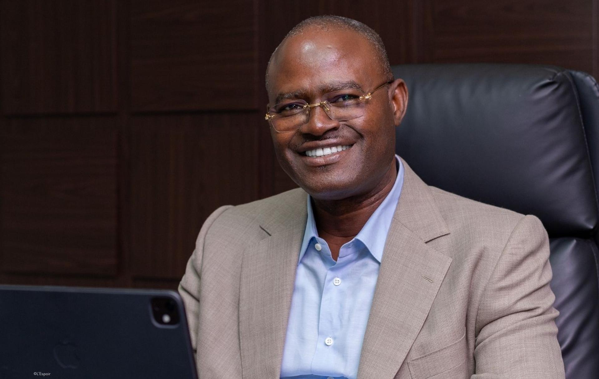 Kerfalla Person Camara (KPC), CEO of Guicopres Group, overseeing a major infrastructure construction site in Guinea.