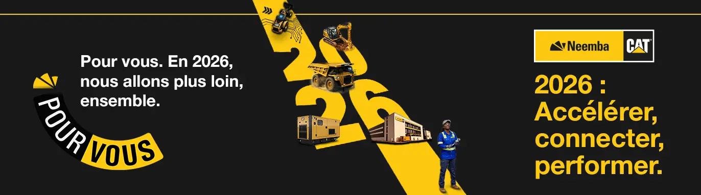 Guinean technicians participating in hands-on training on Caterpillar heavy equipment inside a modern Neemba technical workshop.