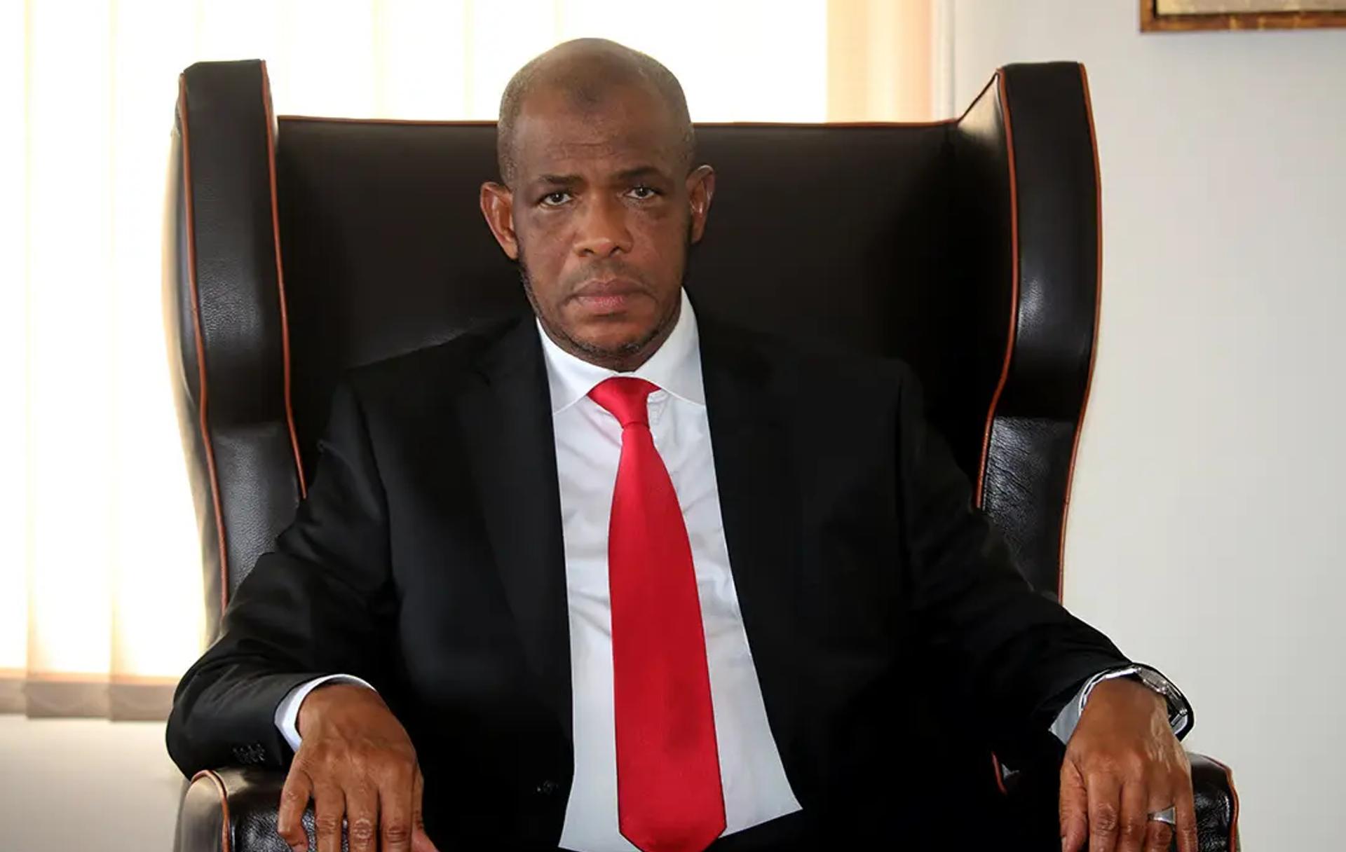 amadou Saliou “Kégnéko” Diallo, founder and CEO of SONOCO Group, standing in front of the Les Moulins d’Afrique (LMA) industrial complex in Conakry.