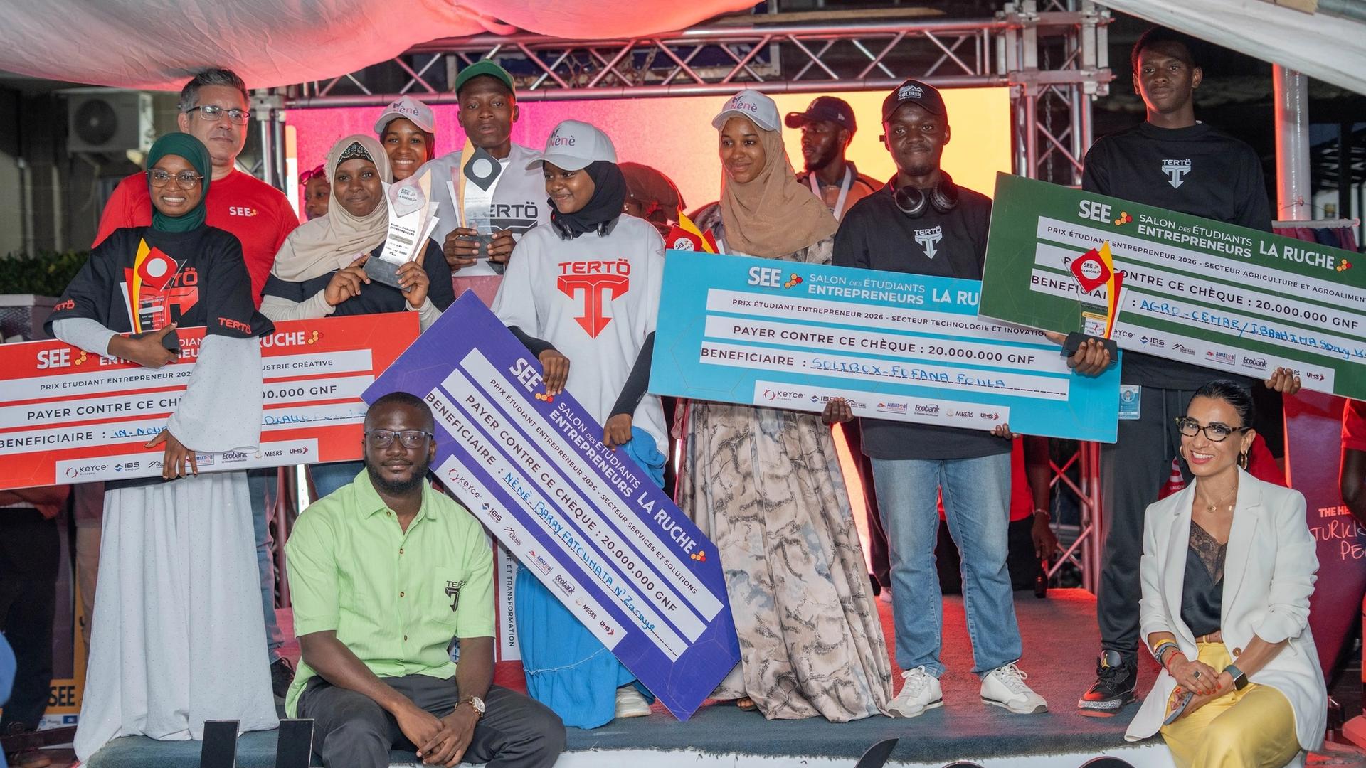 The five Super Winners of the Student Entrepreneurs Fair (SEE5) proudly holding their trophies during the closing ceremony in Conakry.