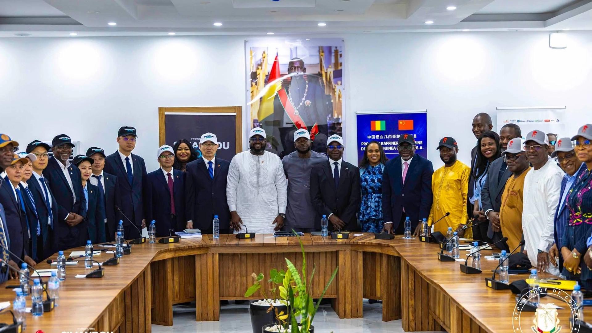 Official signing ceremony of the Chalco Guinea alumina refinery project in Boffa, symbolizing industrial transformation and skills transfer in Guinea.