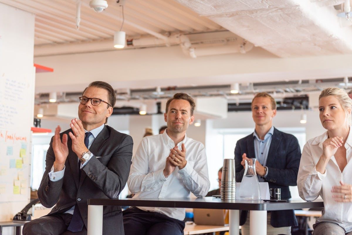 Prince Daniel claps with other individuals in meeting Antler Sweden