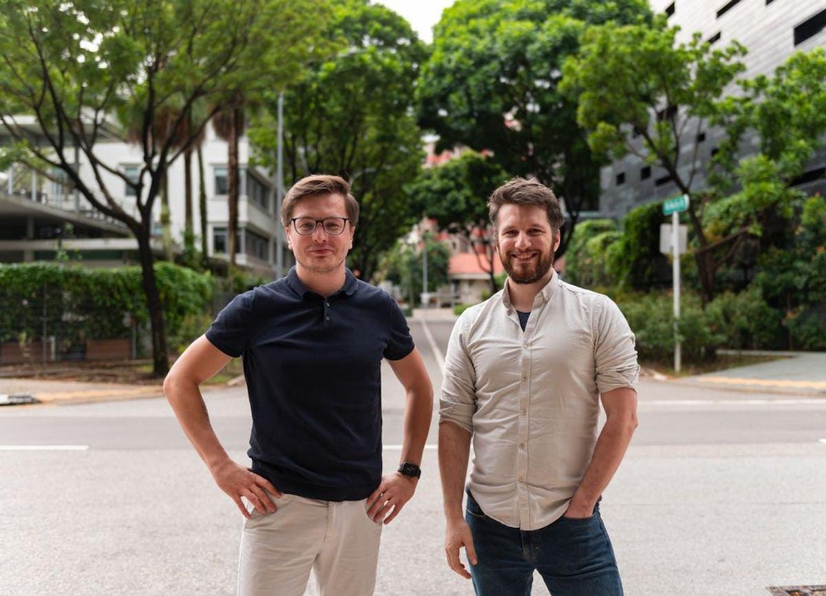 Workclass CEO and CTO Stephan Bruggemann pose outside together smiling