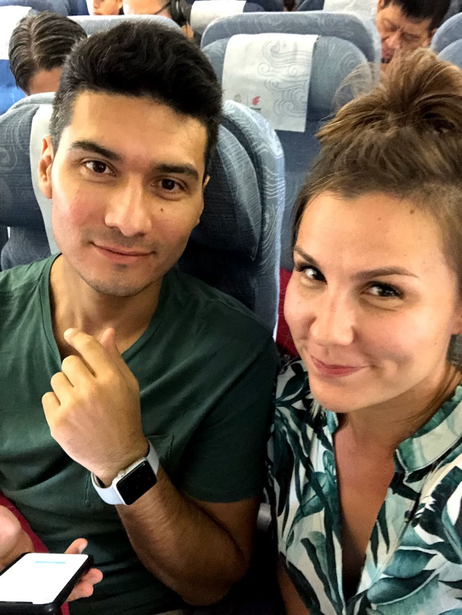 Anna Ratala with Co-Founder Malik on airplane