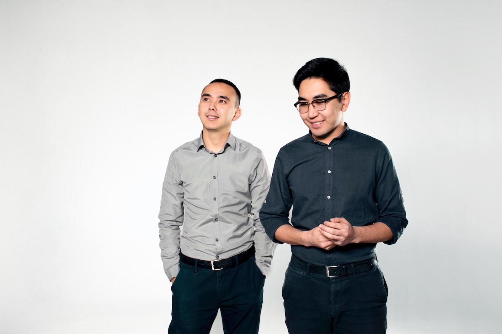 Portrait of Appboxo Appboxo CEO Kaniyet Rayev and CTO Nursultan Keneshbekov with white background