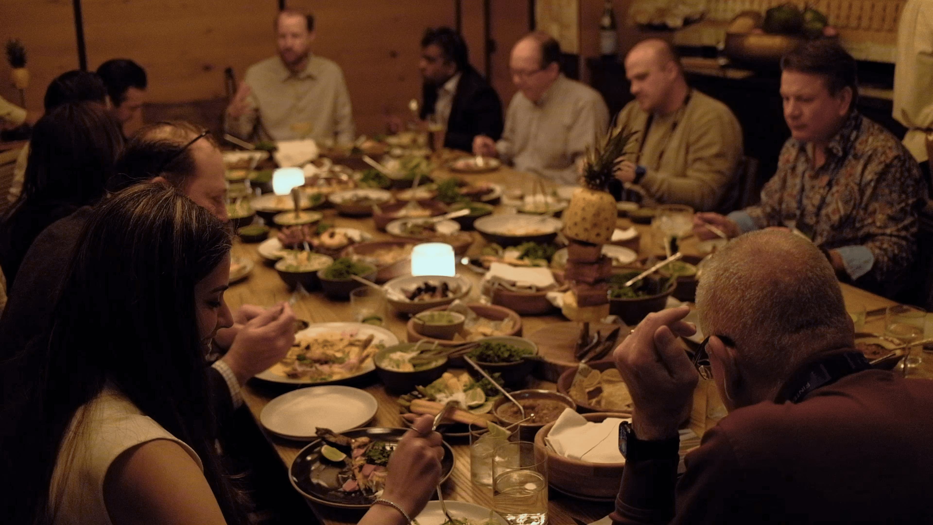 SOLO Picture of Credit Dinner Series Gathering group of bankers around dinner table discussing credit future for consumer and commercial financing in the current climate