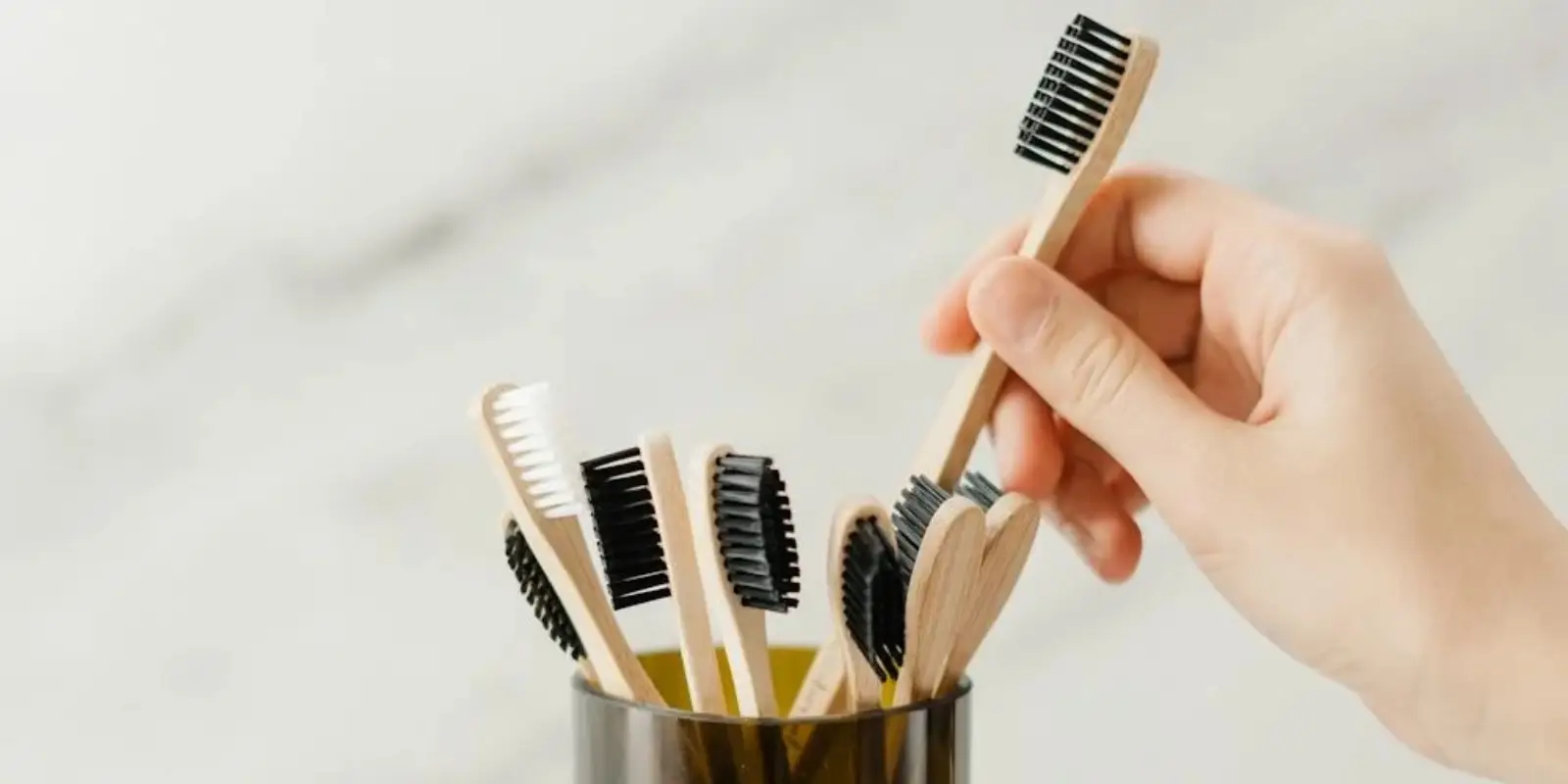 A toothbrush representing maintaining oral hygiene.