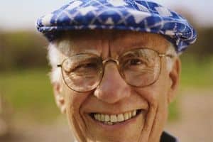 Smiling man — raising the bar in dental care