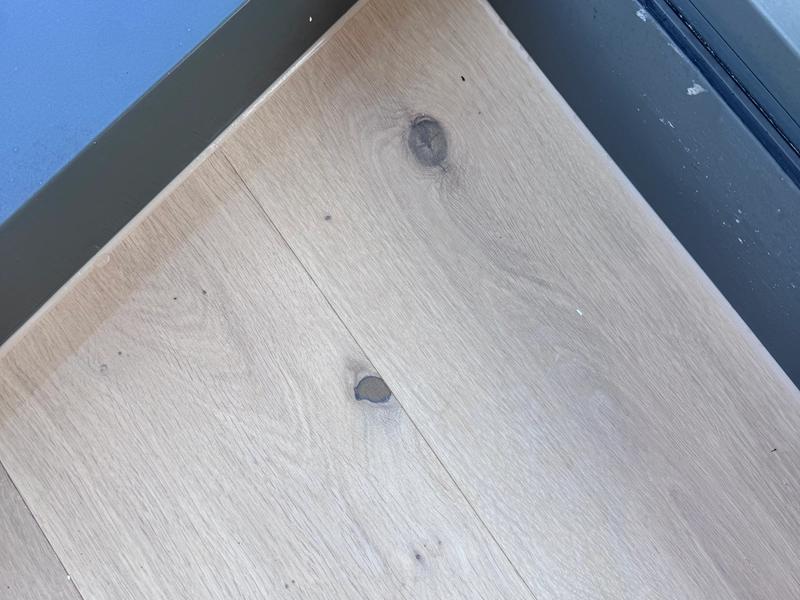 Colour-matched silicone to skirting boards to floor