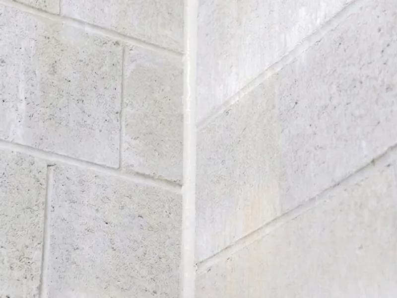 Fire-rated sealing to a blockwork wall junction