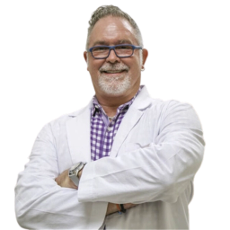 A picture of Dr. John Share smiling at the camera.