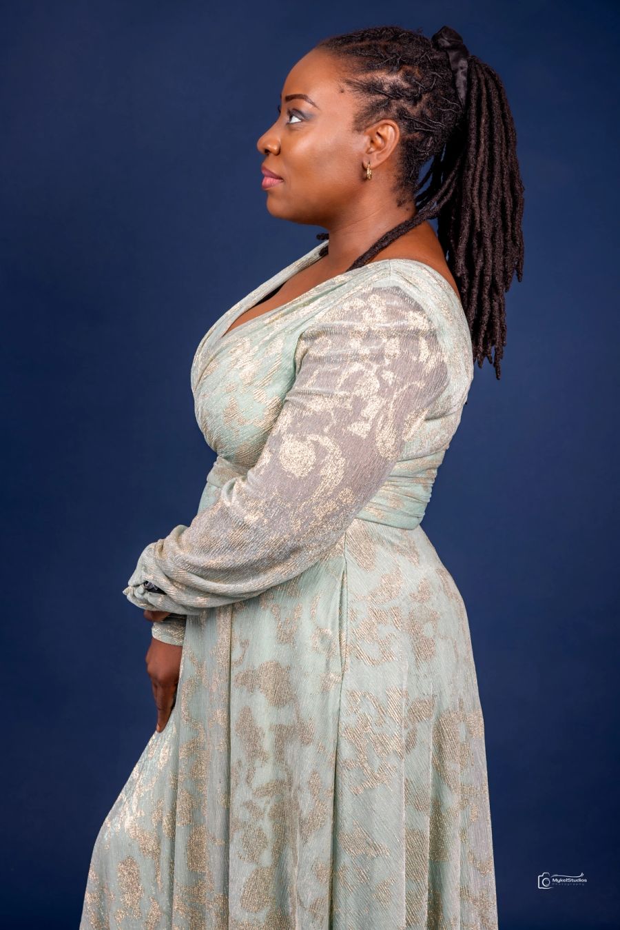 Lady standing and looking away