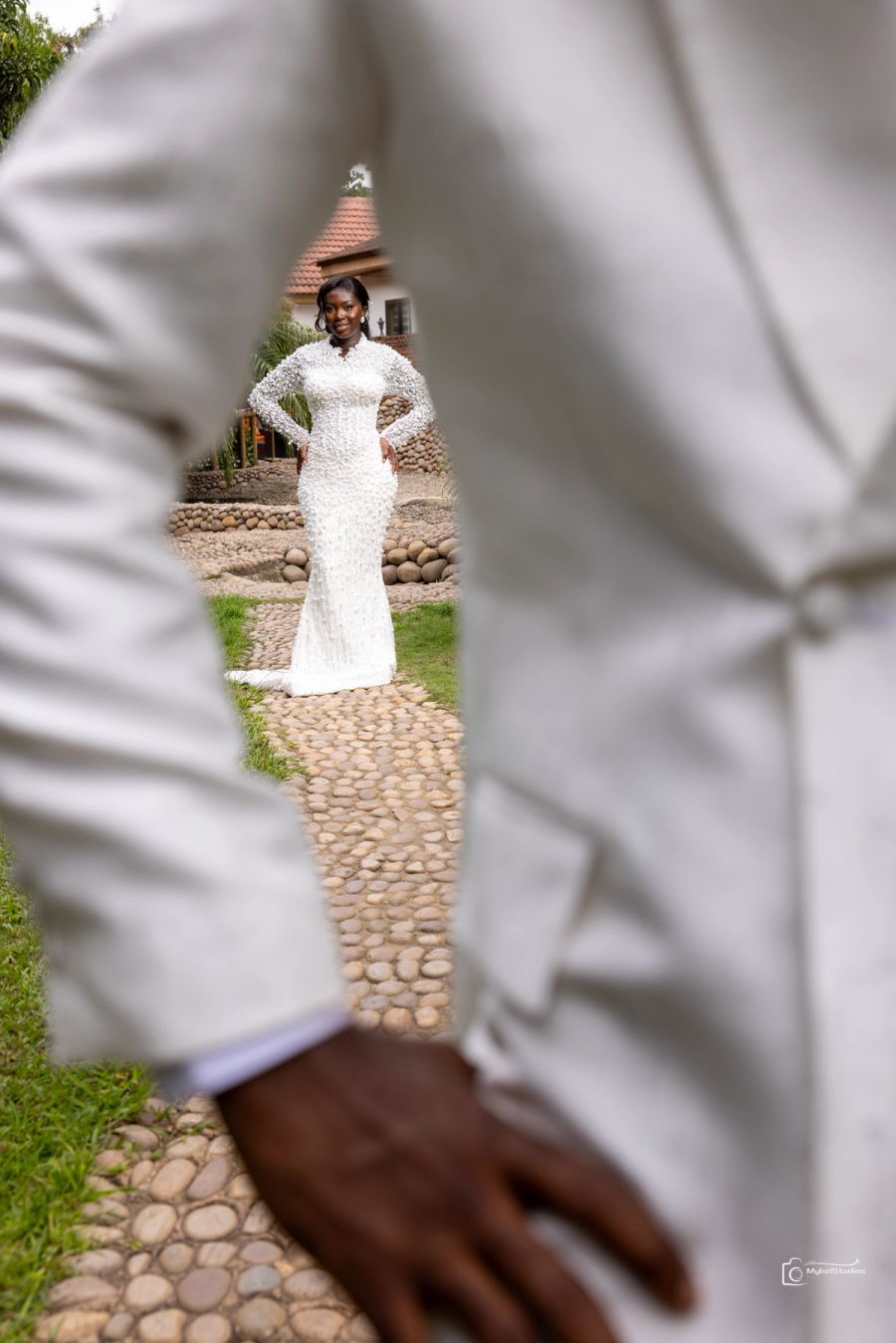 Bride and groom posing for photo