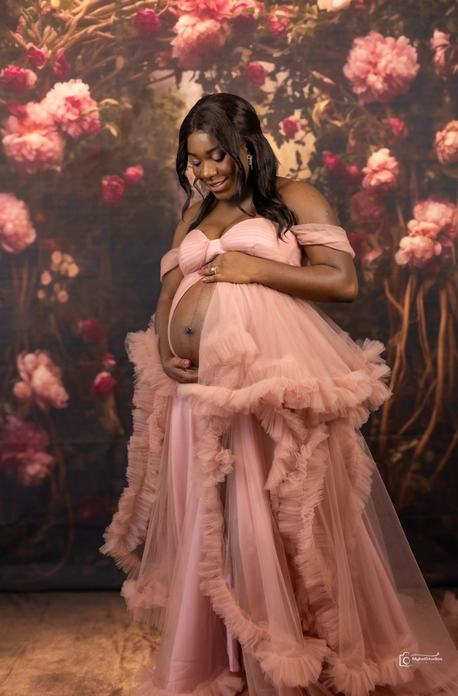 Expecting mother holding belly