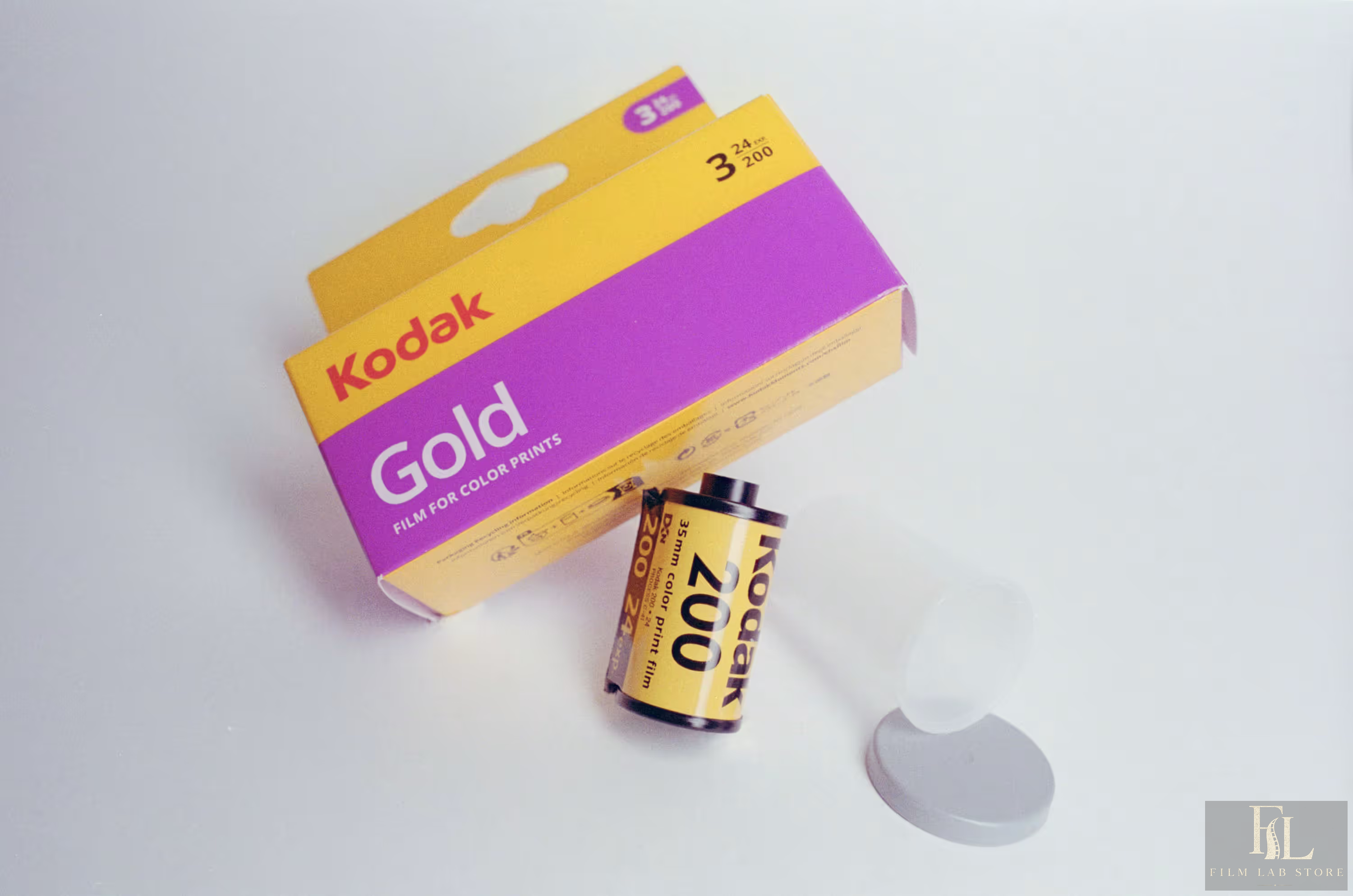 A box and cassette of Kodak Gold 200 colour-negative film