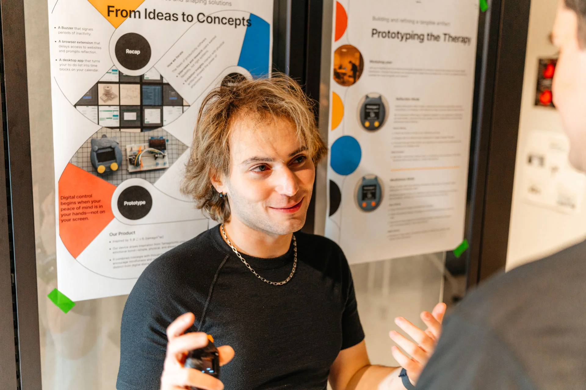 a young person explaining their project