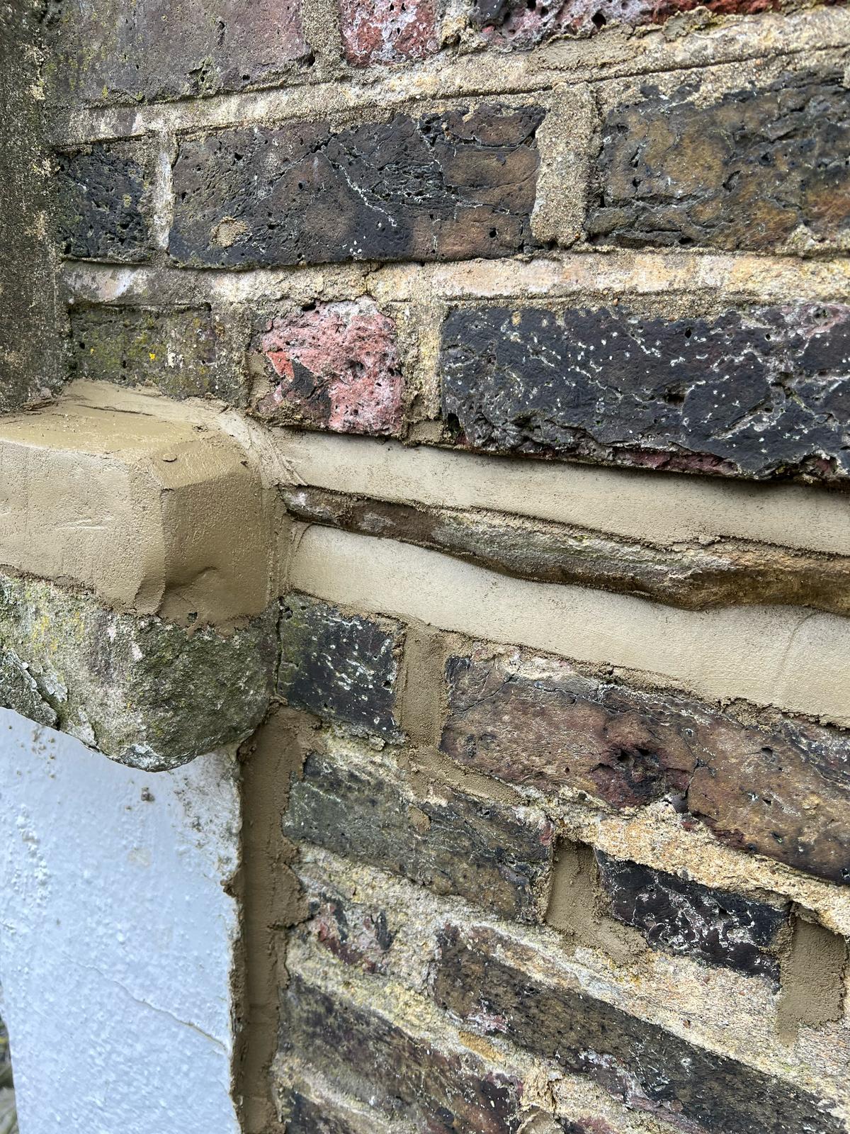 Photo 2 – After: Brickwork repointing completed using rope access, without scaffolding.