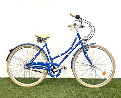 Vélo hollandais bleu à pois blancs