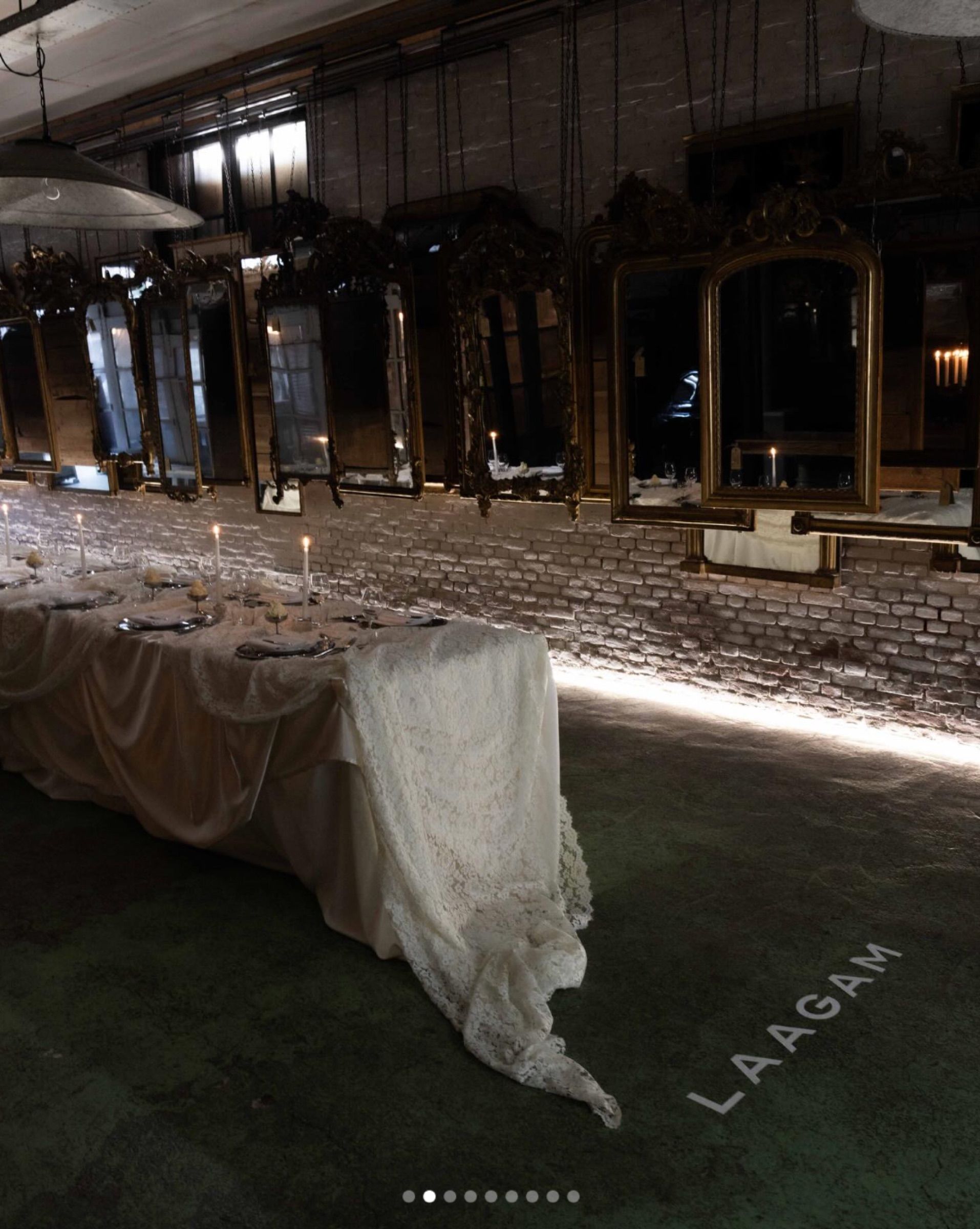 Laagam dinner table on white lace with mirror chargers