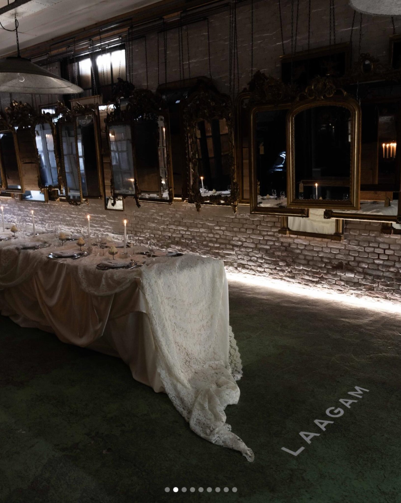 Laagam dinner table on white lace with mirror chargers