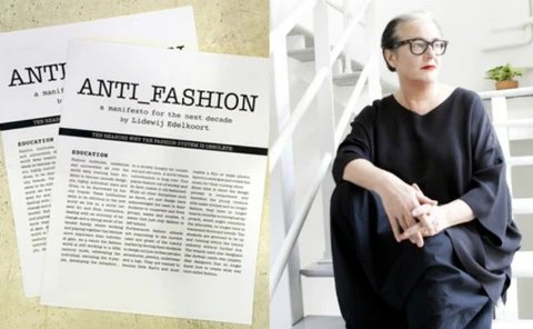Lidewij Edelkoort, dressed in black and wearing glasses, sits next to copies of her 
