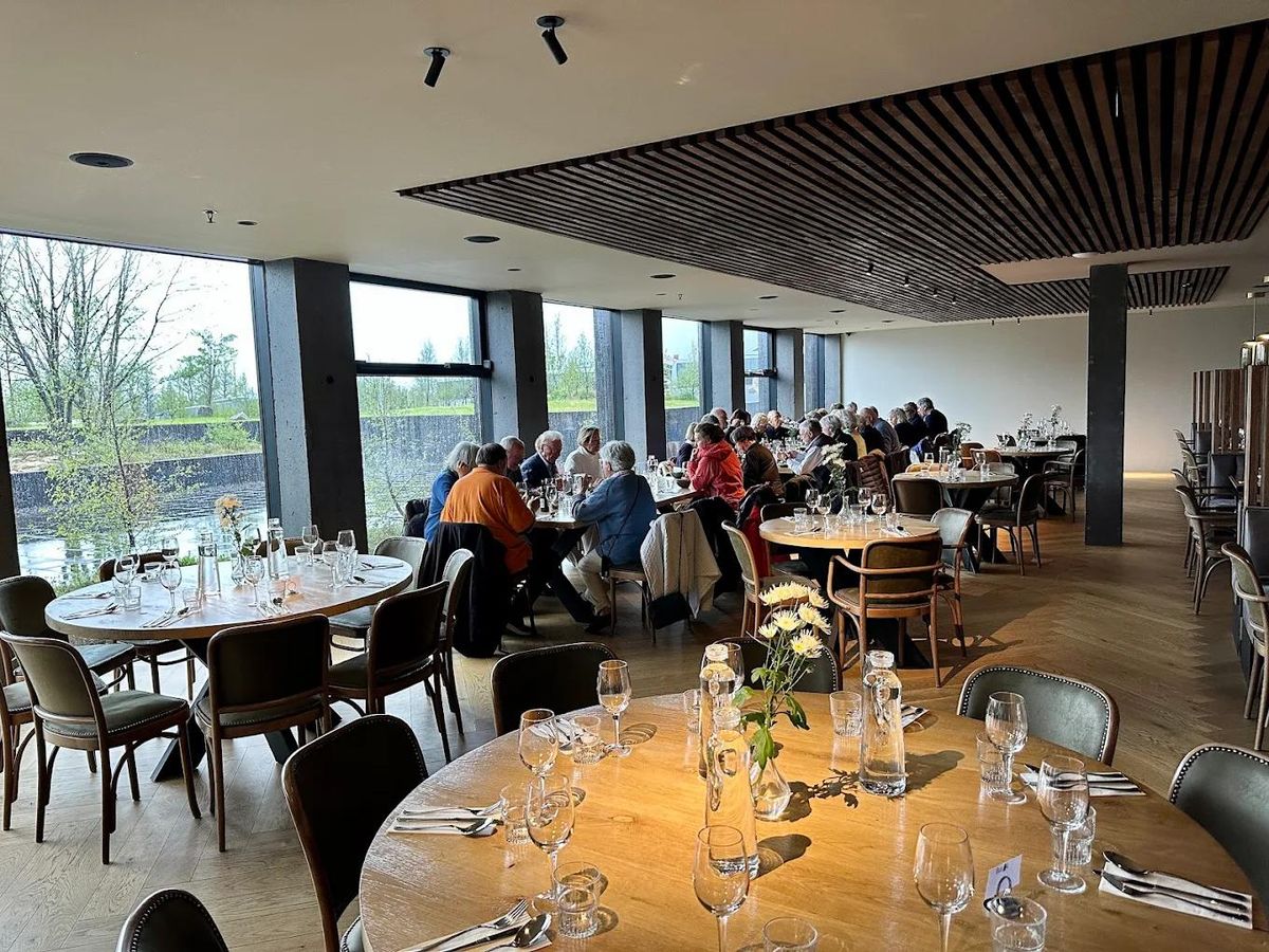The interior of a restaurant with diners
