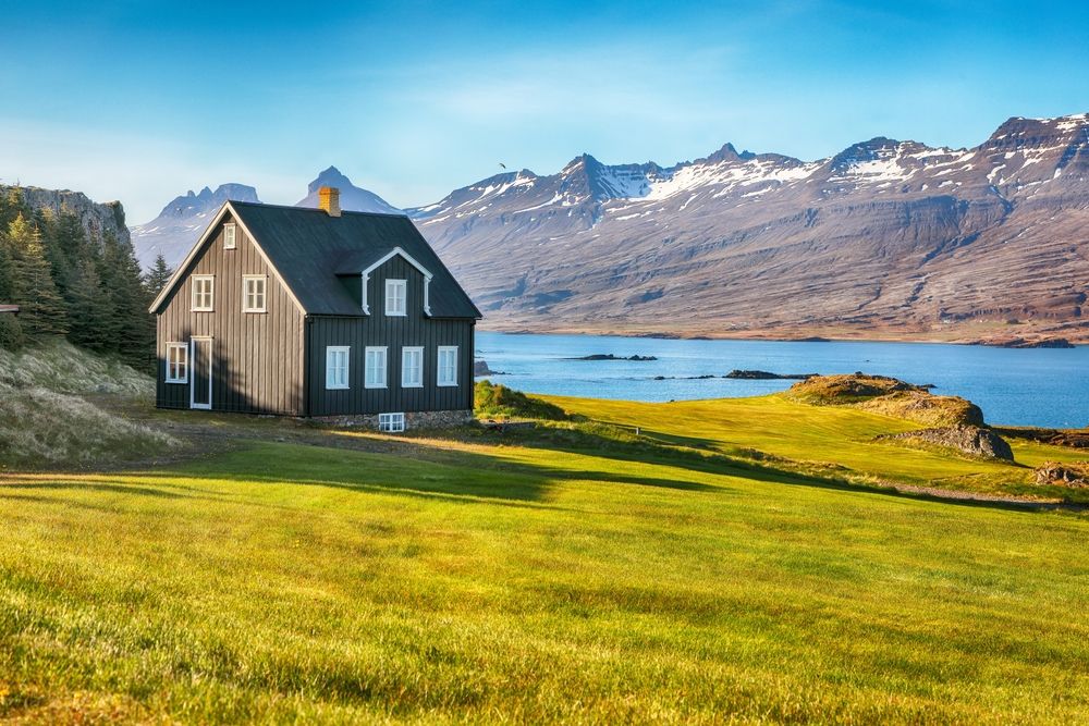 Breathtaking view of old house at Teigarhorn