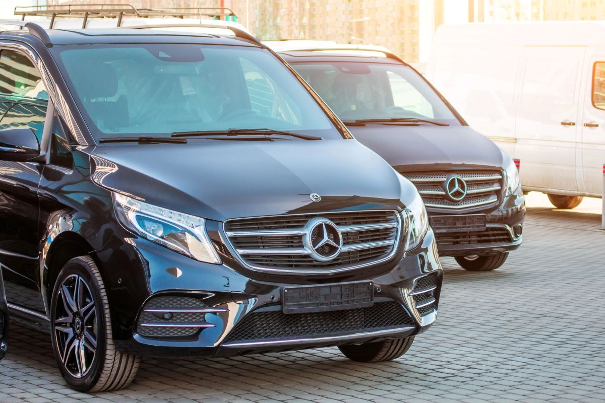 A row of Mercedes vans used for private transfers in Iceland