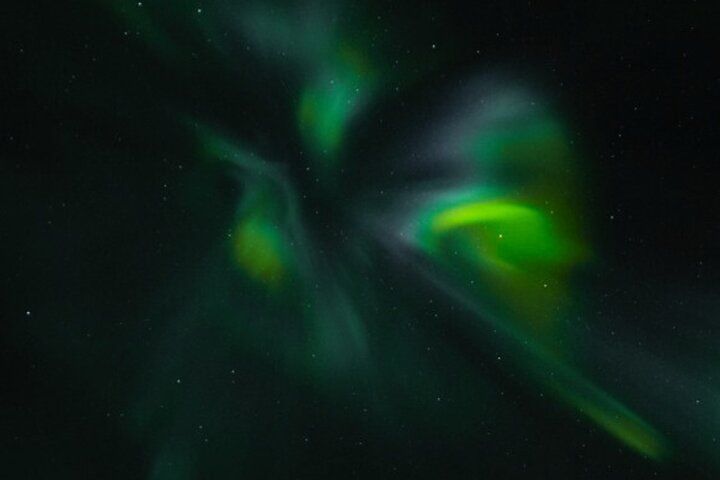 A swirling close-up of green aurora