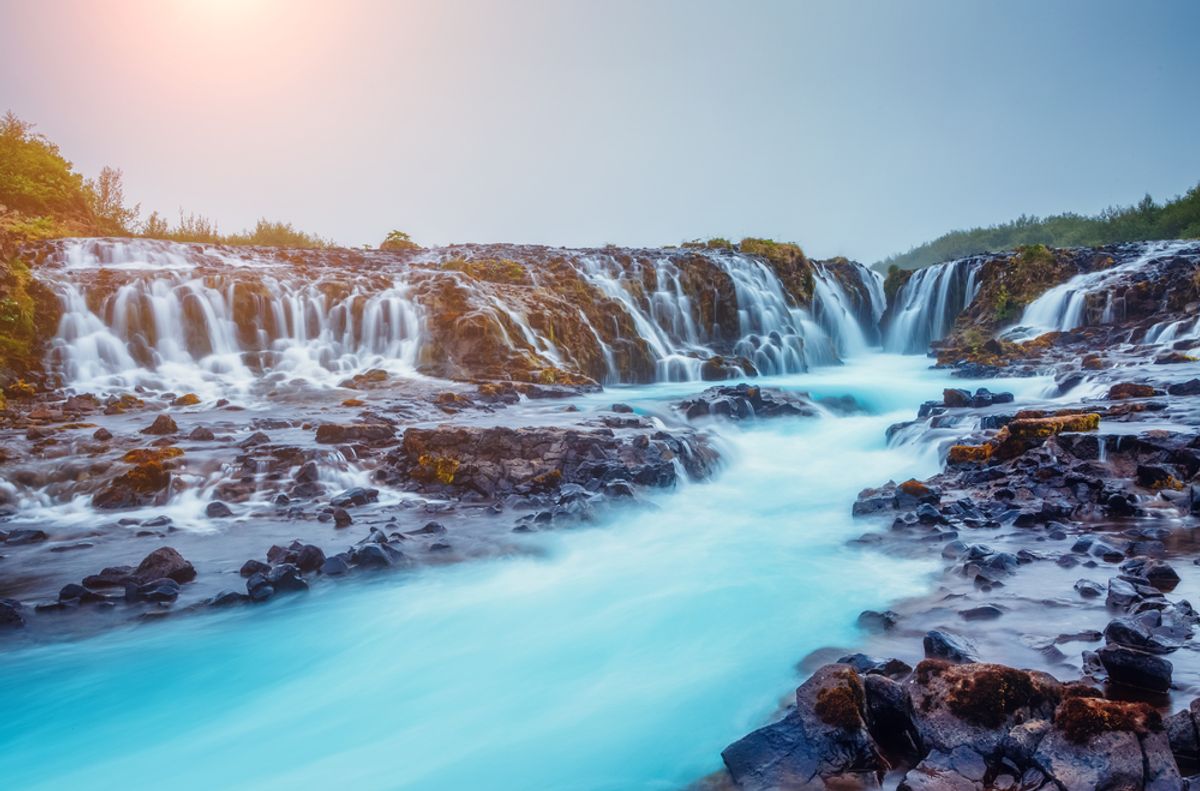 Dramatic views of the bright powerful Bruarfoss waterfall