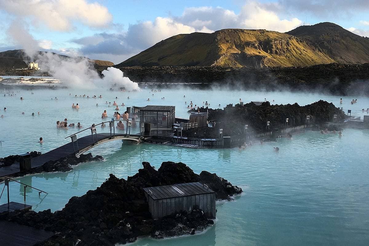 Bathers in the steaming blue water of the Blue Lagoon