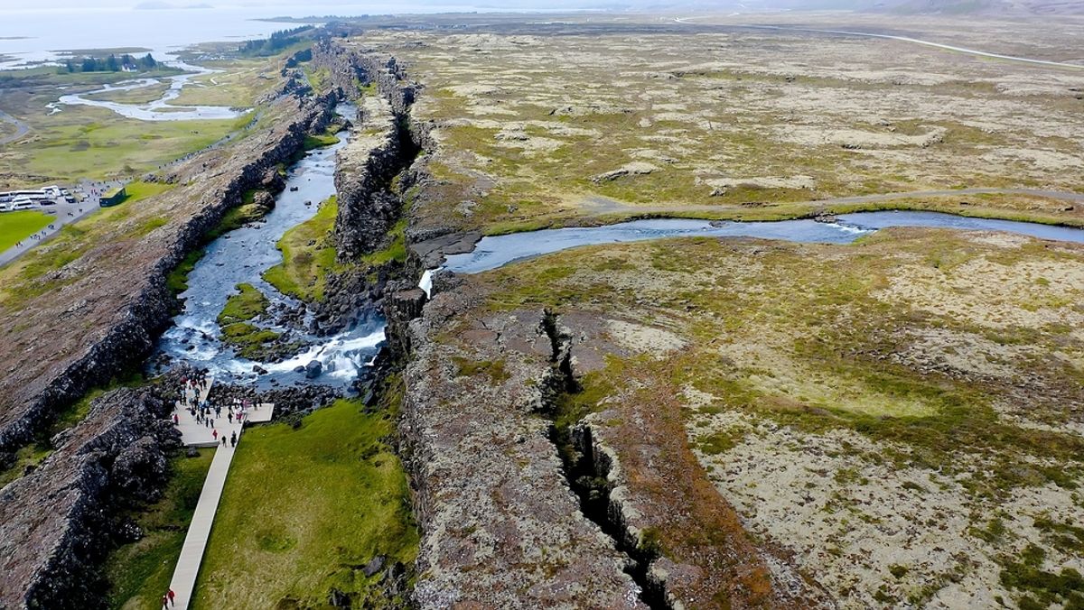 Aerial view of the beautiful Oxararfoss waterfall between tectonic plates, inside the Thingvellir National Park, Iceland