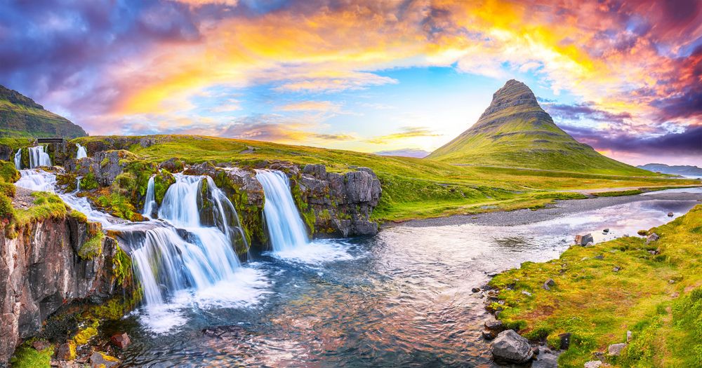 Dramatic view on Kirkjufellsfoss waterfall near Kirkjufell mountain