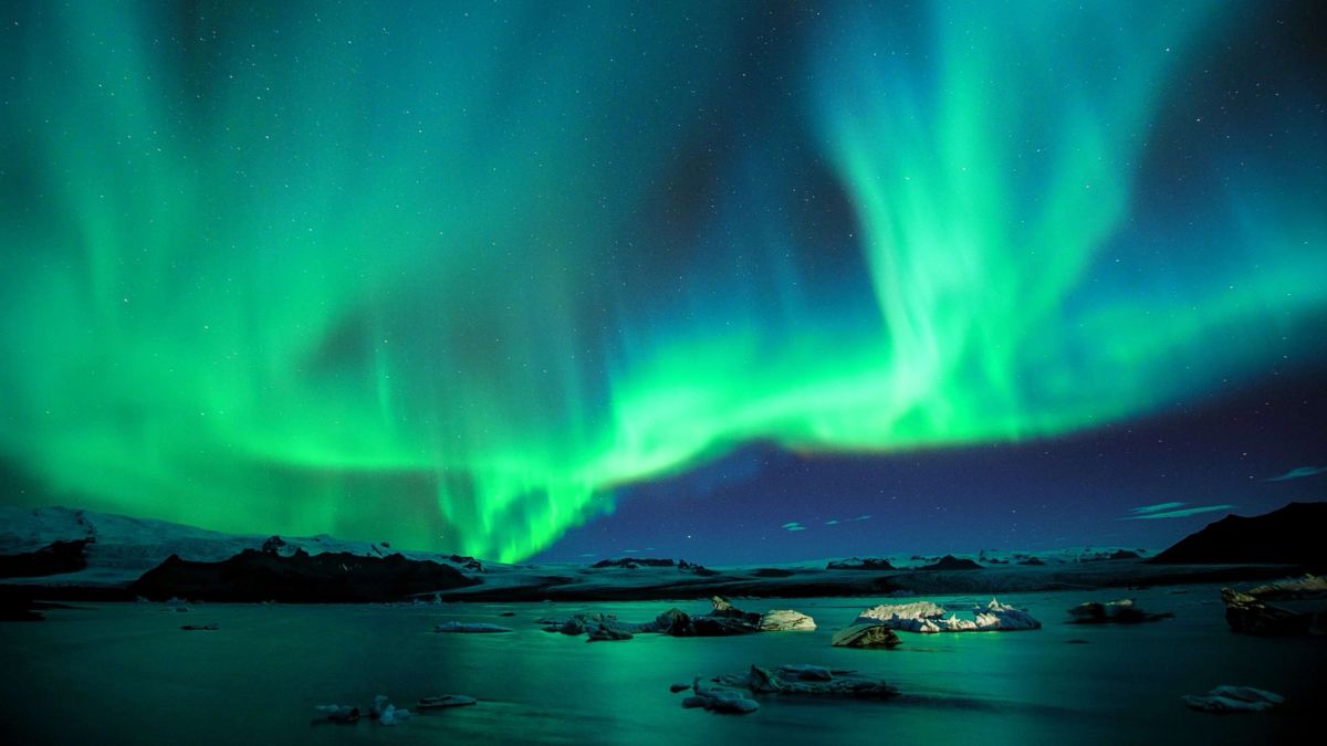 Aurora over icebergs at a glacier lagoon