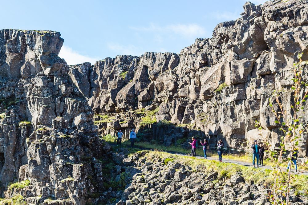 Tourists in Almannagjá Gorge during autumn