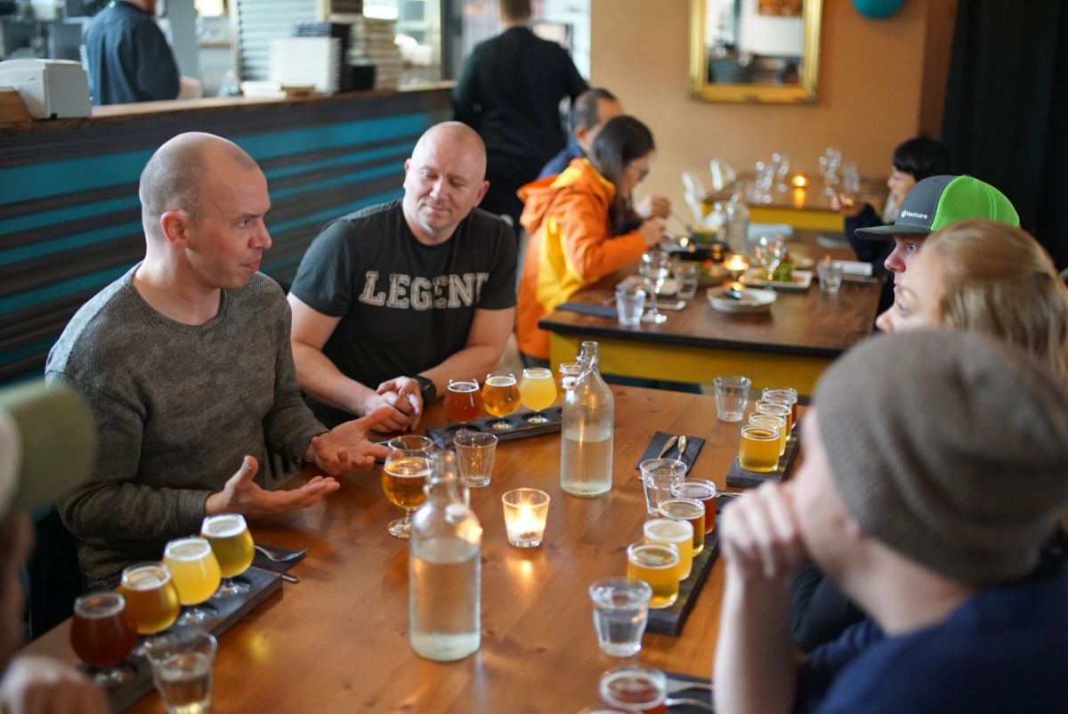 A beer tasting with a group at a table
