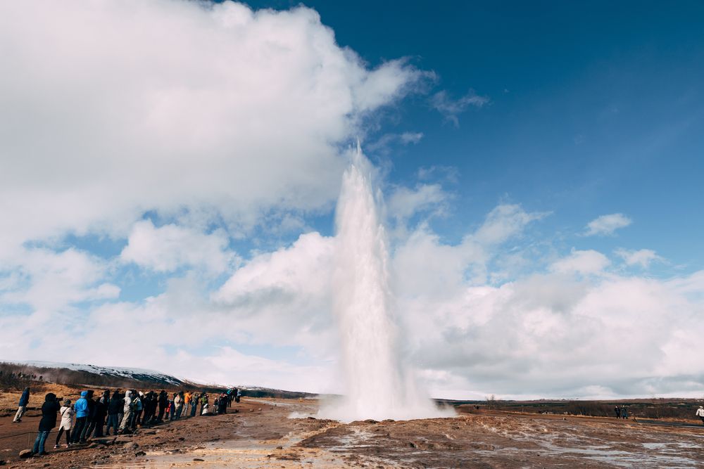 Small bubbling hot springs and fumaroles beside the walking path south of Strokkur