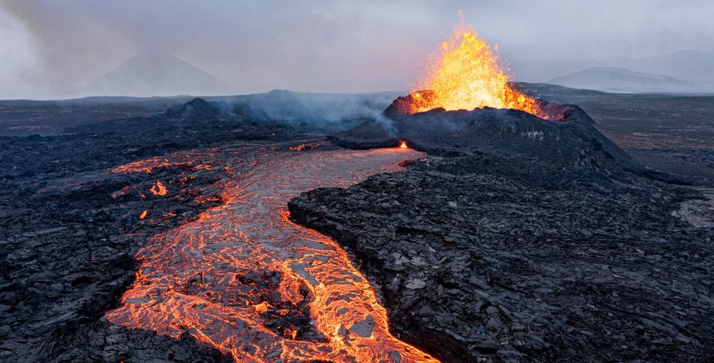 Aerial panoramic view of a volcanic eruption near Litli-Hrútur Hill in the Fagradalsfjall volcanic system on Iceland’s Reykjanes Peninsula