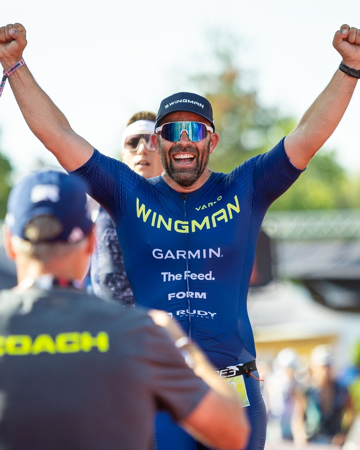 Wingman athlete crossing the finish line