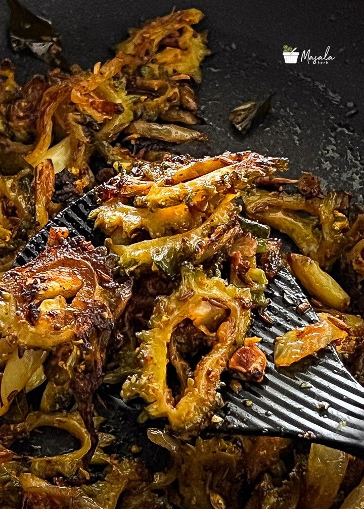 Crispy Bitter gourd fry straight from pan.