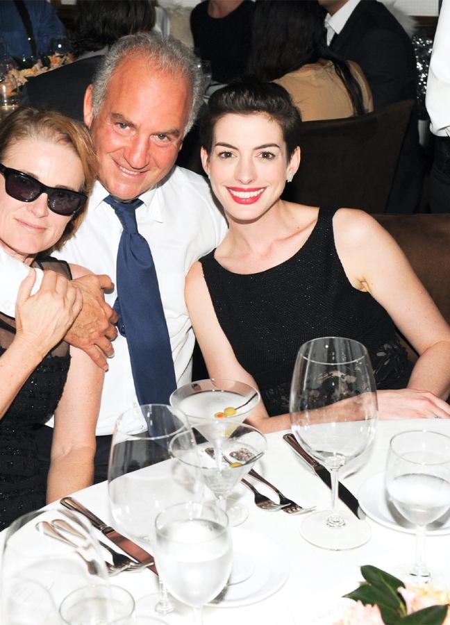 Charles Finch with Lisa Love and Anne Hathaway at the Chanel and Charles Finch Pre-Oscar dinner 2014