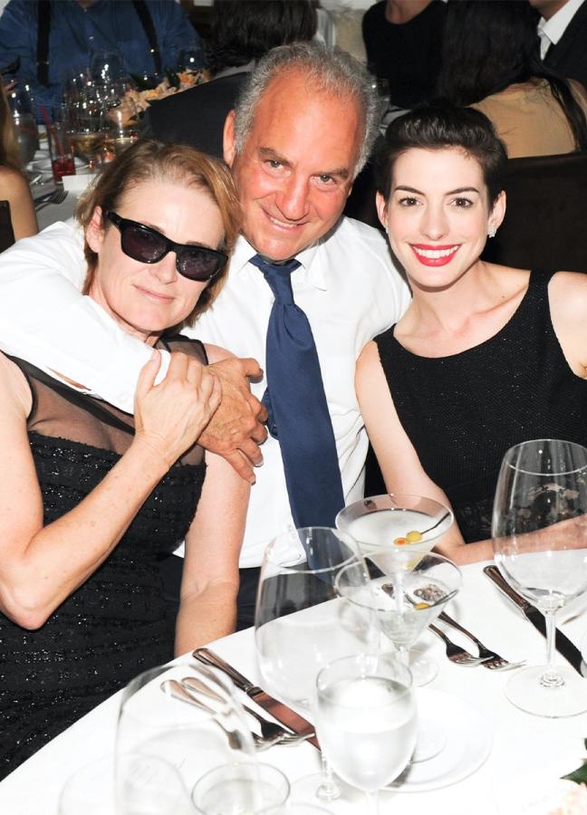 Charles Finch with Lisa Love and Anne Hathaway at the Chanel and Charles Finch Pre-Oscar dinner 2014