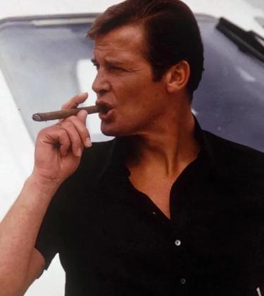 james bond roger moore lighting cigar