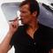 james bond roger moore lighting cigar
