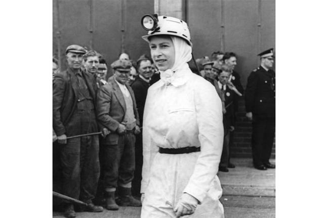 1958. The Queen visiting Rothes Colliery, Fife. She spent about half an hour underground while at the mine (Press Association)